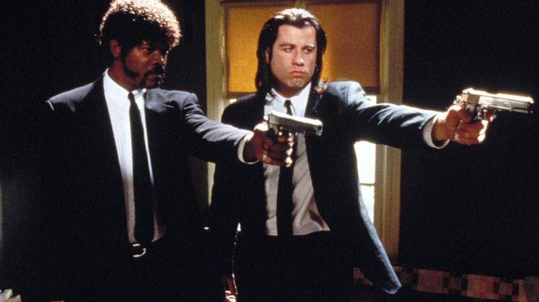 Vincent Vega and Jules Winnfield aiming guns