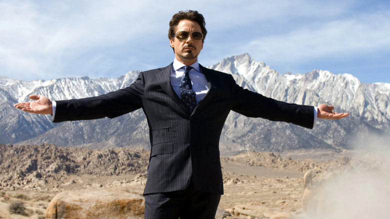 Tony Stark standing with arms out
