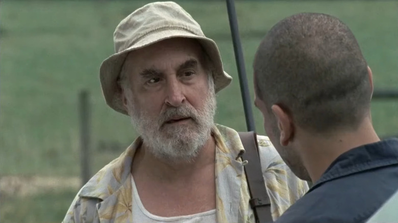 Jeffrey DeMunn's Dale Horvath staring at Jon Bernthal's Shane Walsh in The Walking Dead