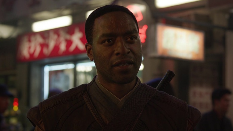 Chiwetel Ejiofor as Karl Mordo in the streets of Hong Kong in Doctor Strange