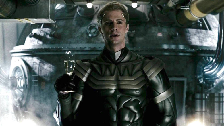 Matthew Goode as Ozymandias holding champagne in Watchmen