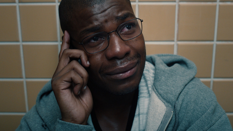 John Boyega as Brian Brown-Easley crying on the phone in Breaking