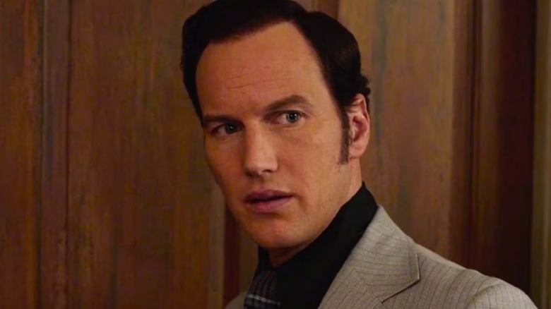 Ed Warren (Patrick Wilson) looks intently in The Conjuring