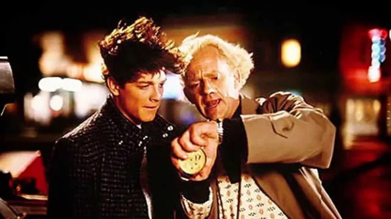 Eric Stoltz as Marty McFly standing next to Doc Brown