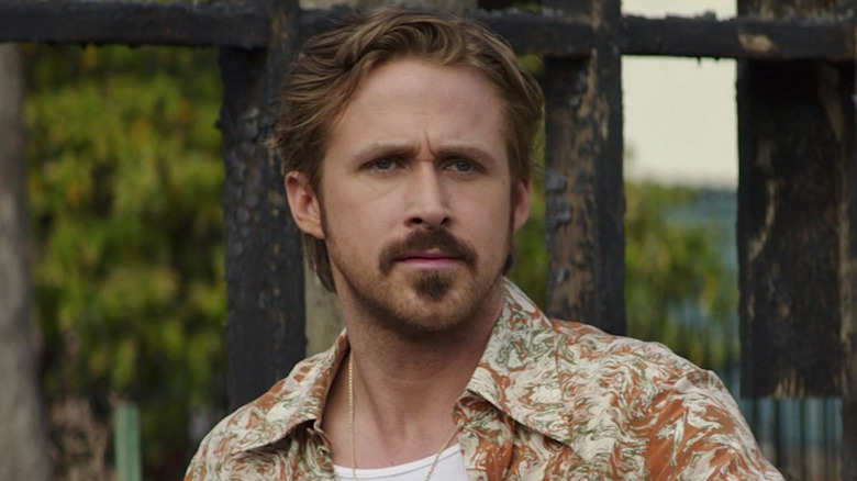 Ryan Gosling with mustache looking confused