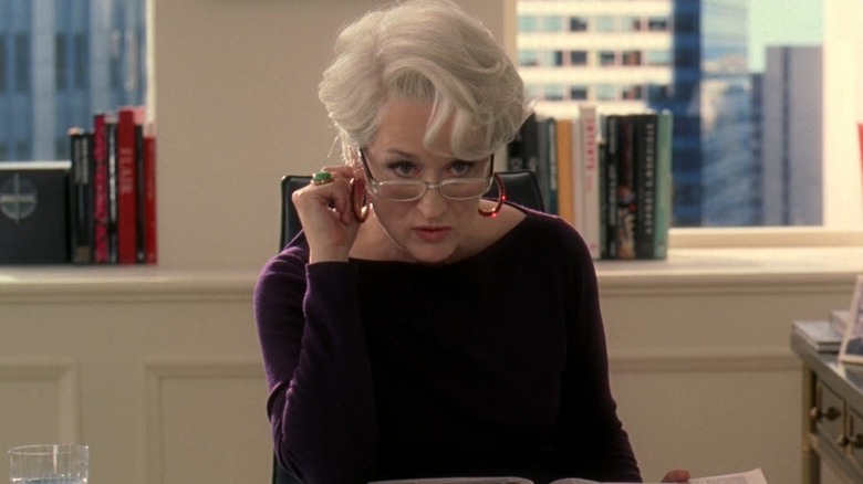 Meryl Streep as Miranda Priestly, leaning in to insult her co-stars