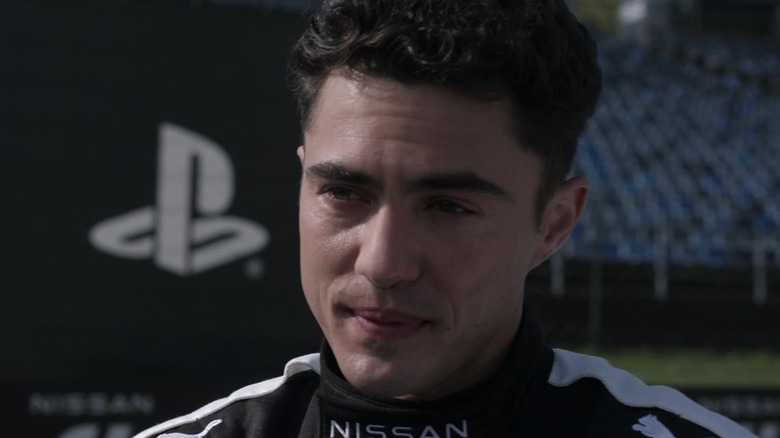 Darren Barnet as Matty Davis on a race track in the Gran Turismo film