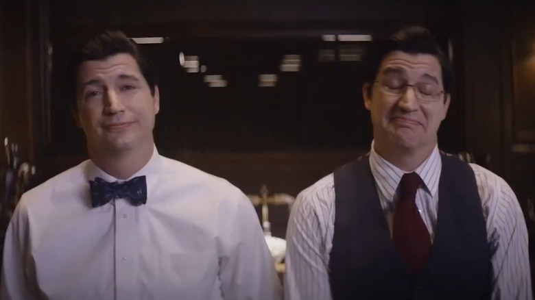 Ken Marino as Lenny and Larry Lehman in an office on the Showtime series Black Monday