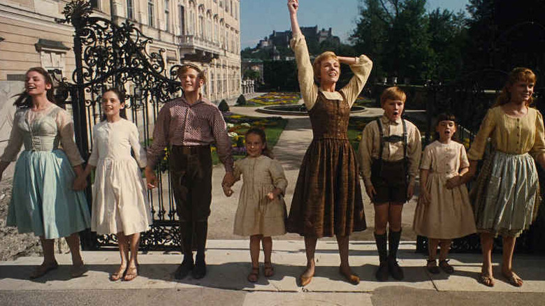 Maria and the Von Trapp kids in The Sound of Music