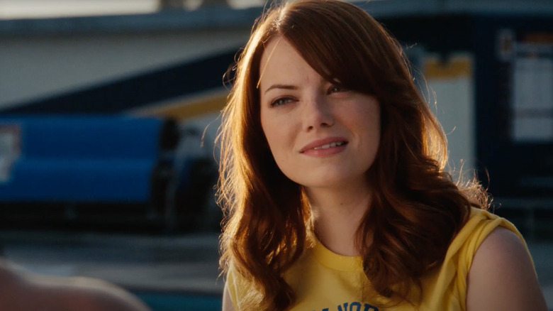 Emma Stone as Olive Penderghast bites her lip in Easy A