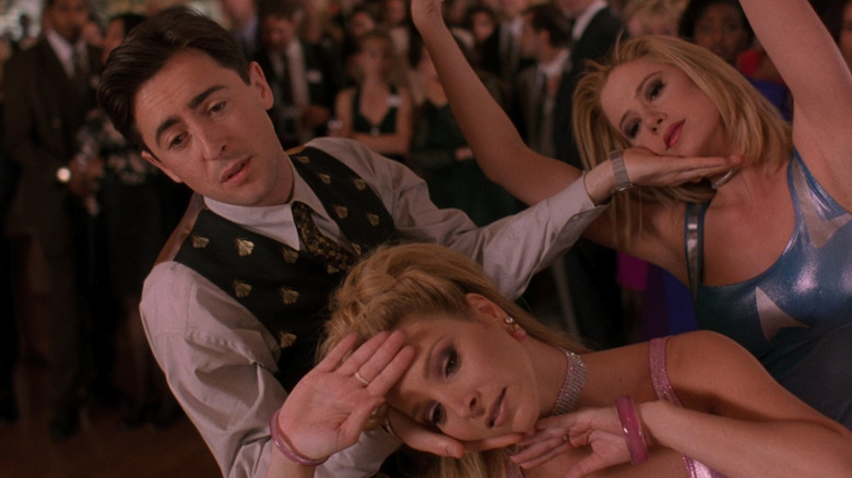 Lisa Kudrow as Michele Weinbergerand Mira Sorvino as Romy White dance with Alan Cumming as Sandy Frink in in Romy & Michele's High School Reunion