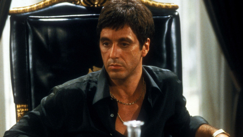 Al Pacino as Tony Montana looking concerned in Scarface