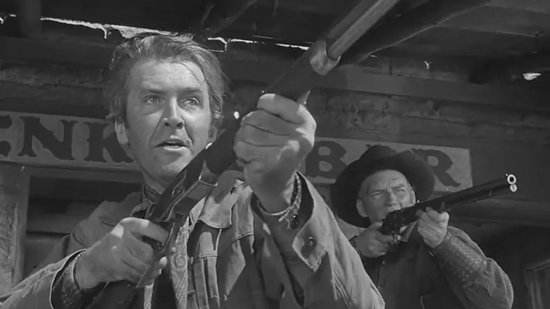 Lin McAdam (James Stewart) fires rifle in Winchester '73