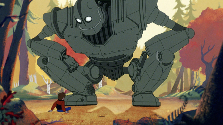 The Iron Giant watches Hogarth in the woods in The Iron Giant