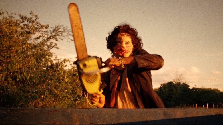 Leatherface with his chainsaw in The Texas Chain Saw Massacre