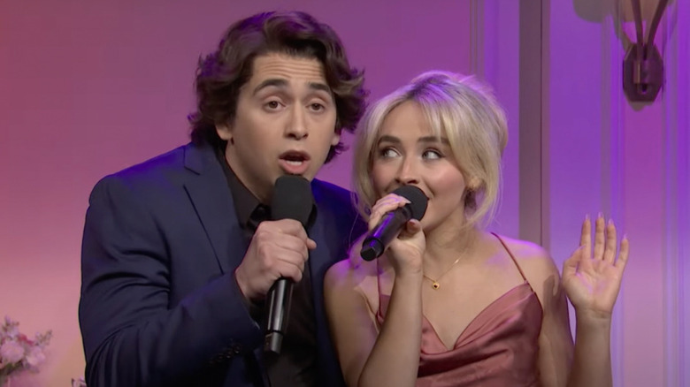 Marcello Hernandez as Domingo alongside Sabrina Carpenter in a sketchfrom SNL's 50th anniversary special