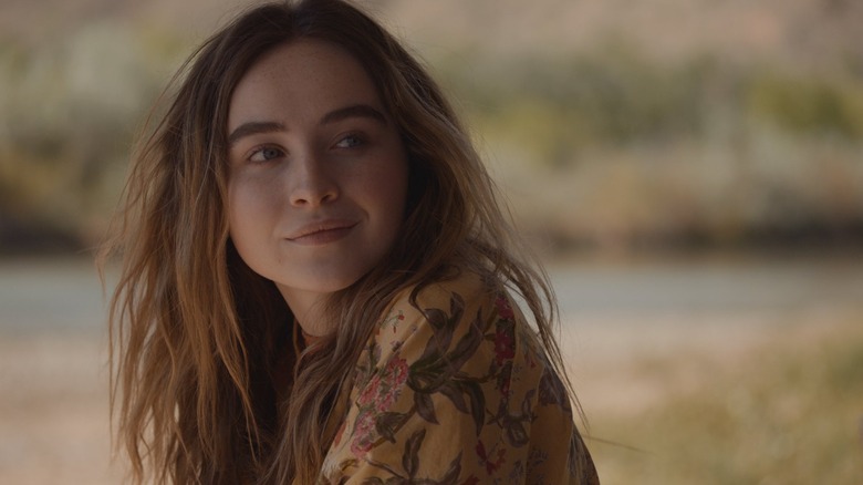 Sabrina Carpenter as Nola in The Short History of the Long Road