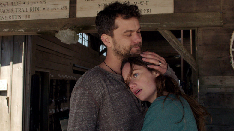 Joshua Jackson as Cole hugging Ruth Wilson as Alison in The Affair