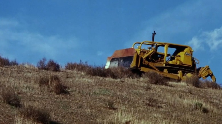 bulldozer countryside sky