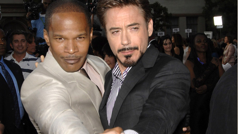 Jamie Foxx and Robert Downey Jr. side by side at a movie premiere