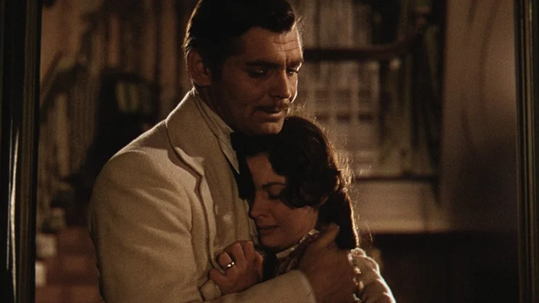 Clark Gable and Vivien Leigh as Rhett and Scarlett embracing in Gone With the Wind