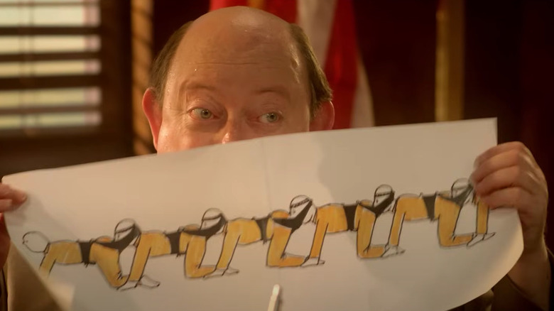 Laurence R. Harvey as Dwight explaining human centipede in The Human Centipede 3: Final Sequence