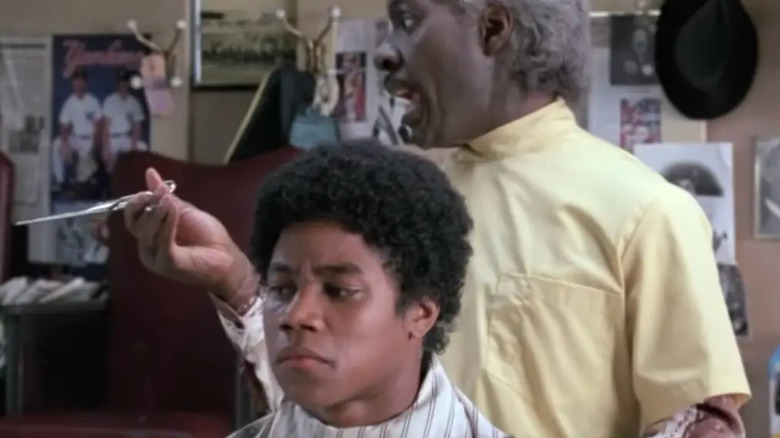 Cuba Gooding Jr. getting a haircut in Coming to America