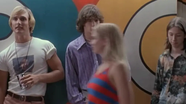 Renee Zellweger walking past a bunch of boys in Dazed and Confused