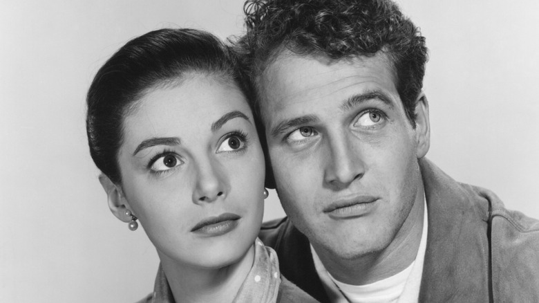 Pier Angeli and Paul Newman in a publicity still for Somebody Up There Likes Me, looking up