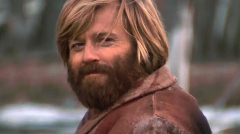 Robert Redford smiles as Jeremiah Johnson