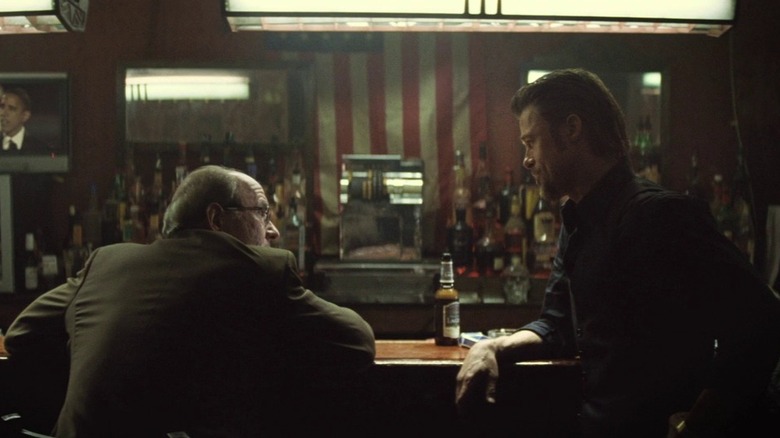 Richard Jenkins and Brad Pitt on election night 2008 in Killing Them Softly