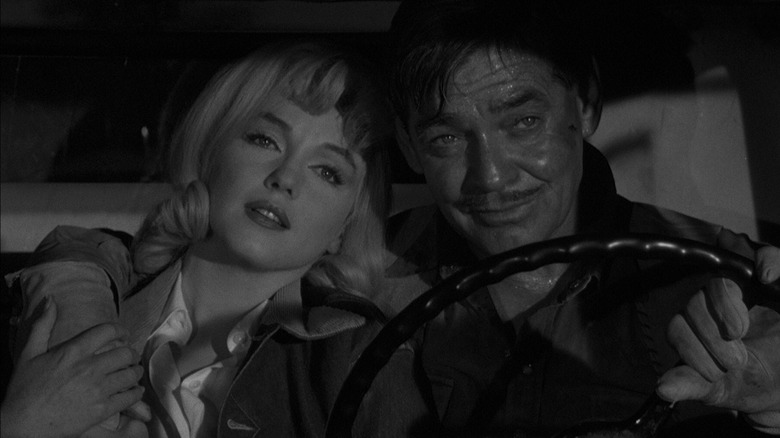 Clark Gable driving with Marilyn Monroe in The Misfits