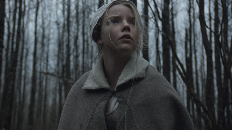 Anya Taylor-Joy afraid in woods