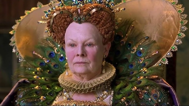 Queen Elizabeth I wearing a neckpiece made of peacock feathers in Shakespeare in Love