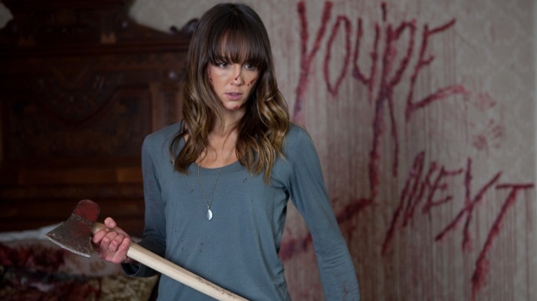 You're Next's Sharni Vinson holding axe