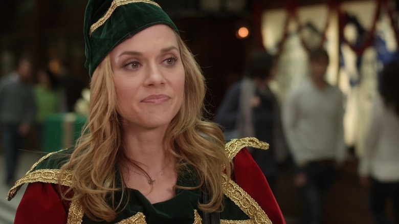 Krissy Kringle looking sad in an elf outfit in Naughty or Nice