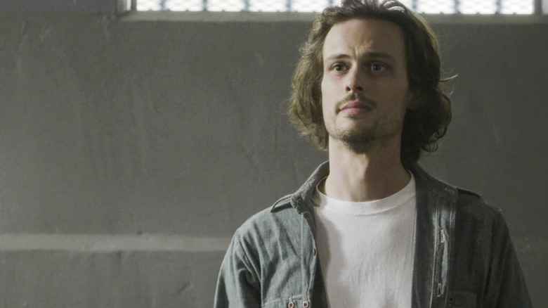 Matthew Gray Gubler's Reid looking sad in what looks like a prison in Criminal Minds