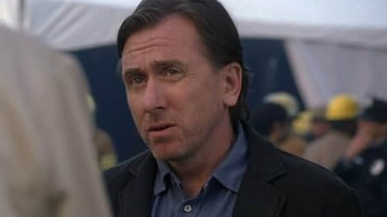 Tim Roth's Cal looking at someone offscreen in Lie To Me