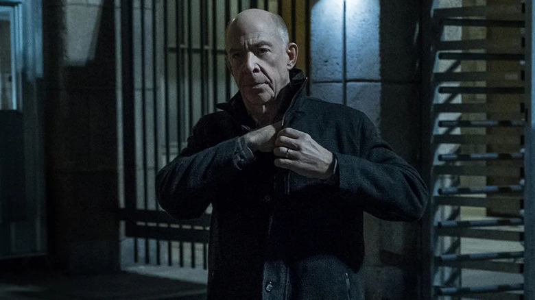 J.K. Simmons as Howard Silk Prime, reaching into his jacket on Counterpart