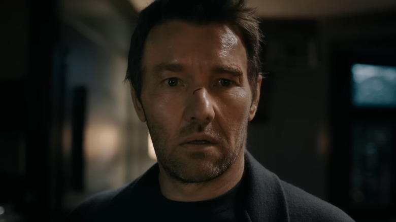 Joel Edgerton as Jason Desson, appearing concerned and bleeding on Apple TV's Dark Matter