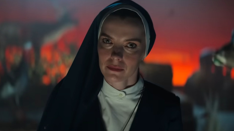 Betty Gilpin as Sister Simon, glaring angrily on Mrs. Davis