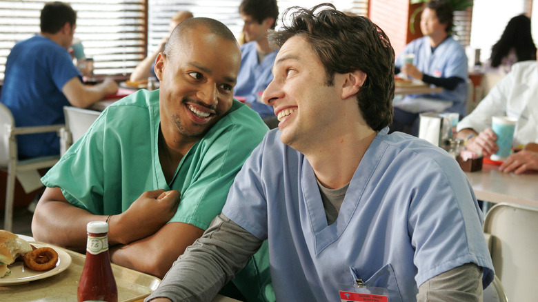 JD and Turk smiling in cafeteria