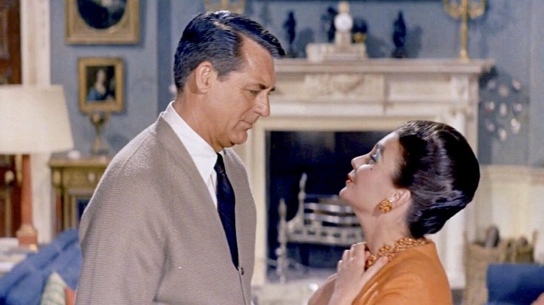 Cary Grant looks disapprovingly at Jean Simmons