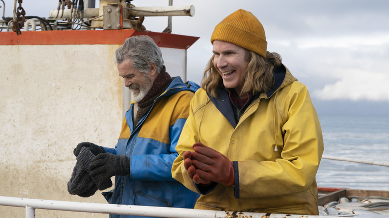 Ferrell and Pierce Brosnan laughing on boat