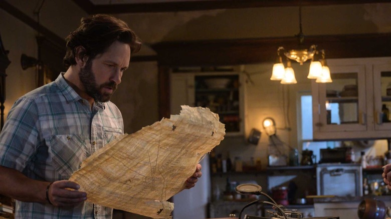 Paul Rudd looks at an old map