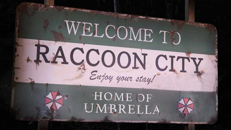 A battered Raccoon City sign