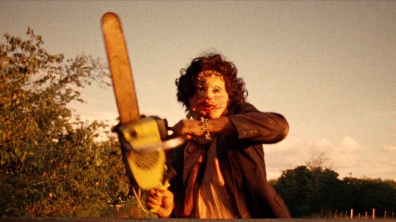 Leatherface brandishes his chainsaw