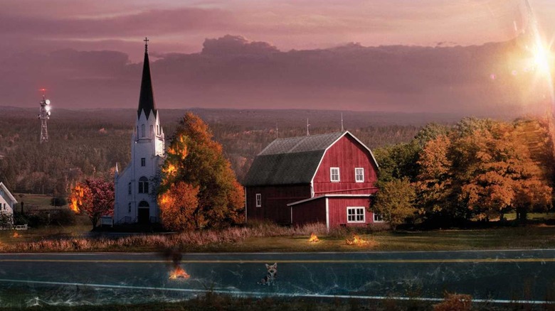 A rural town with the dome barely glimpsed, for Under the Dome