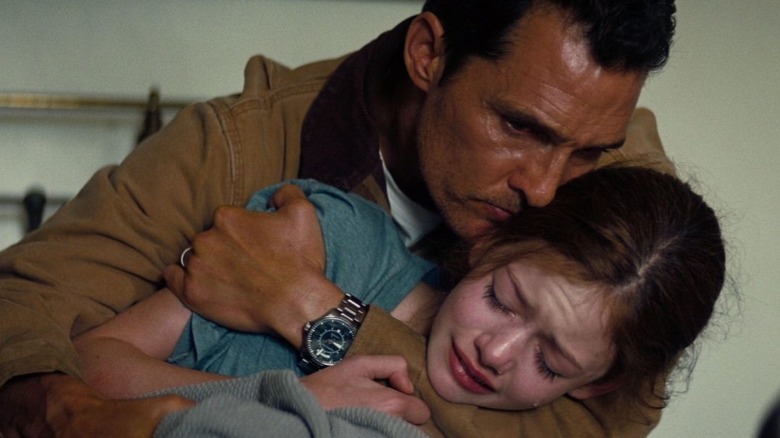 Matthew McConaughey and Mackenzie Foy hugging in Interstellar