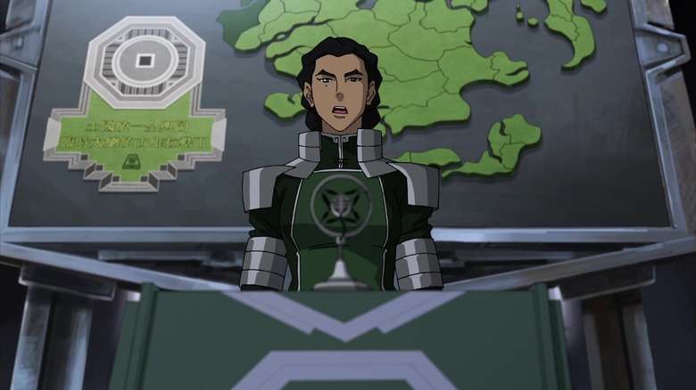 Kuvira standing before a map of Earth Empire in The Legend of Korra